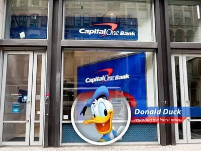 The financial industry is in for a quacktastic merger as Capital One swoops in to buy Discover Financial Services. image